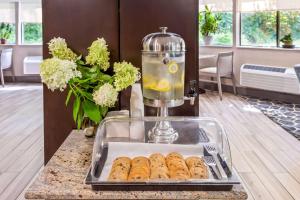 a food machine sitting on a counter with pastries at Best Western West Lebanon-Hanover in West Lebanon
