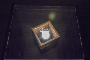 a glass table with a white vase on it at Martine Dimore Storiche di Puglia in Martina Franca
