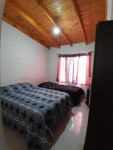 Ένα ή περισσότερα κρεβάτια σε δωμάτιο στο Dpto 9- Mi casita