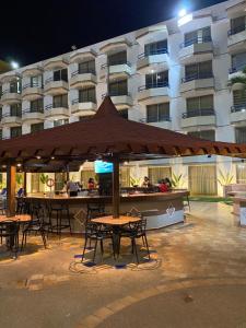 Restaurace v ubytování Apartamento vacacional en el Hotel Dynasty , Habitación tipo Estudio PRIVADO