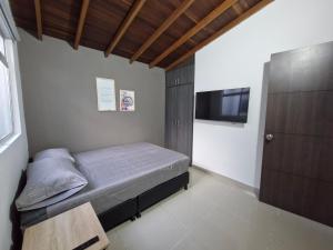 Postel nebo postele na pokoji v ubytování 302 Apartamento Completo en Medellín