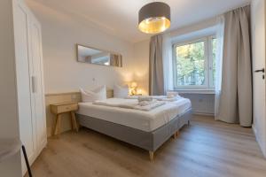 Postel nebo postele na pokoji v ubytování Hotel Doerenkamp - Digital Access