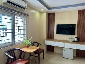 TV a/nebo společenská místnost v ubytování Thanh Hiền HB Hotel