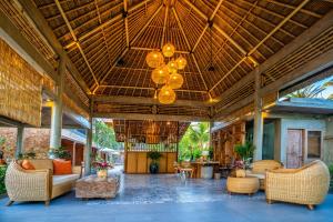 Posezení v ubytování Kahayana Suites Ubud