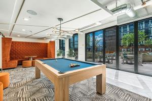a billiard room with a pool table at Impeccable1B Salt Palace & Delta - PoolSpaGymPrkgViews in American Towers Condominium