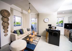 a living room with a couch and a table at Refa 304 in Santo Domingo