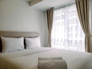 Galeriebild der Unterkunft Minimalist and Tidy 2BR Apartment at Tokyo Riverside PIK 2 By Travelio in Rawalembang