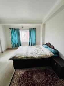 Postel nebo postele na pokoji v ubytování Muma Home Stay