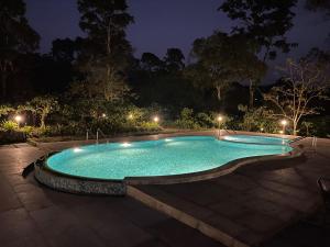 Bazén v ubytování Magnolia Estates & Resorts nebo v jeho okolí