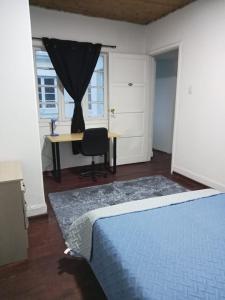 Postel nebo postele na pokoji v ubytování Hermosas habitaciones super ubicadas + 1 fotografie
