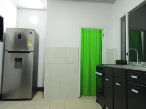 Kuchyň nebo kuchyňský kout v ubytování Hermosas habitaciones super ubicadas