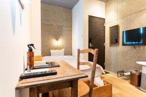 TV a/nebo společenská místnost v ubytování HOTEL fah