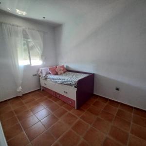 Postel nebo postele na pokoji v ubytování Villa TRANQUILA