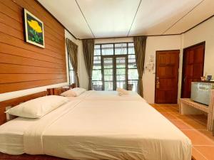 Voodi või voodid majutusasutuse Vongdeuan Resort toas
