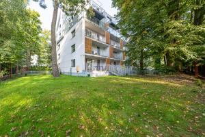 Zahrada ubytování ApartamentyPrzyMorzu 010 z Basenem Tarasem i Ogródkiem