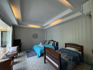 Voodi või voodid majutusasutuse Vongdeuan Resort toas