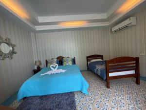 Voodi või voodid majutusasutuse Vongdeuan Resort toas