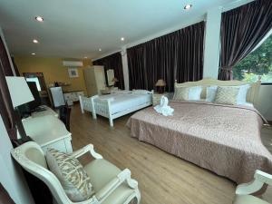 Voodi või voodid majutusasutuse Vongdeuan Resort toas