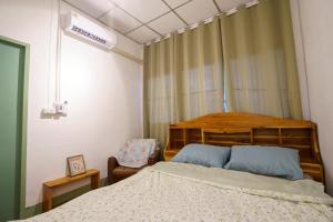 Ta Kaew Hostel ตาแก้ว โฮสเทล客房内的一张或多张床位