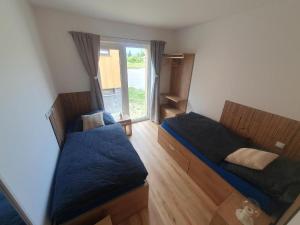 Postel nebo postele na pokoji v ubytování Apartmán AMALI Deluxe