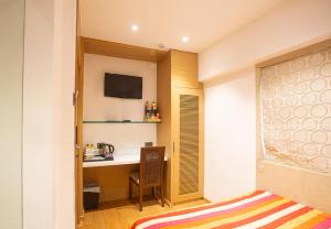 Postel nebo postele na pokoji v ubytování Hotel Bawa Continental