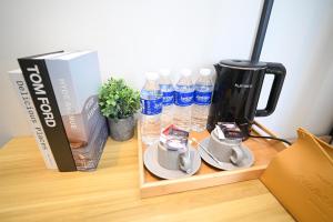 Příslušenství pro přípravu čaje a kávy v ubytování Swing & Pillows - KL Pekeliling