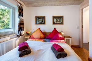 Ένα ή περισσότερα κρεβάτια σε δωμάτιο στο Öko Fewo Silbermöwe