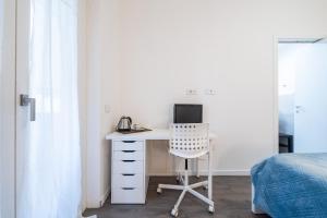 TV a/nebo společenská místnost v ubytování Casa Prati