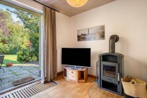 Μια τηλεόραση ή/και κέντρο ψυχαγωγίας στο Öko Fewo Silbermöwe