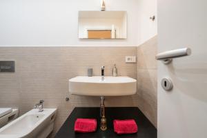 Koupelna v ubytování Casa Prati + 16 fotografií