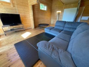 Χώρος καθιστικού στο large log cabin 桜 +32 φωτογραφίες