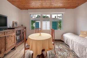 Postel nebo postele na pokoji v ubytování Villa de famille pour 13 à 200m de la mer