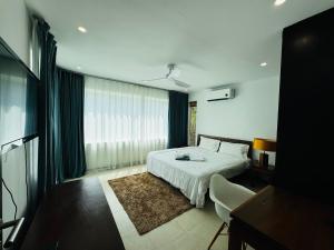 Ένα ή περισσότερα κρεβάτια σε δωμάτιο στο Seaview Prima Villa Karon beach +20 φωτογραφίες