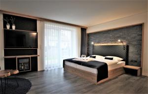 Postel nebo postele na pokoji v ubytování Privat & Boutique Hotel Plauer See
