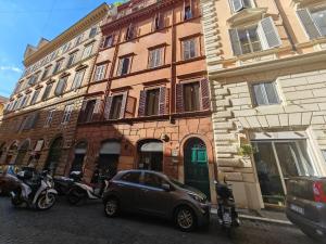 a car parked in front of a building at Cozy Luxury Room Pantheon in Rome