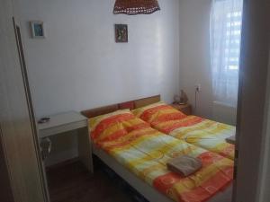 Postel nebo postele na pokoji v ubytování Bungalov Mikulášovice
