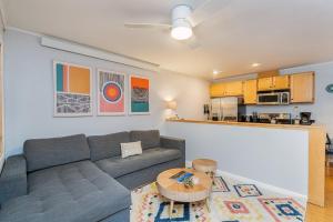 a living room with a couch and a table at Comfy Casual Near Gondola & Main Street! Needle Rock 3 condo in Telluride