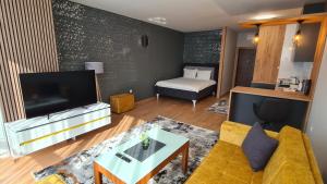 TV a/nebo společenská místnost v ubytování Hotel Kakanj