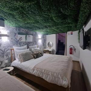 Postel nebo postele na pokoji v ubytování Ubud suite and spa