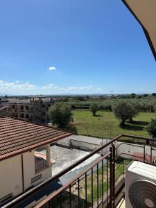 a balcony with a view of a field at Dimora dei Colli in Pignataro Maggiore