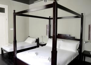 Letto o letti in una camera di Casa Colonial