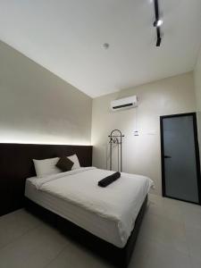 Hotel Seri Kangsar KK Hotel客房内的一张或多张床位