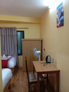 Rúm í herbergi á Rambler's Hotel
