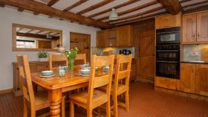 Kuchyň nebo kuchyňský kout v ubytování Tudor Manor + 23 fotografií