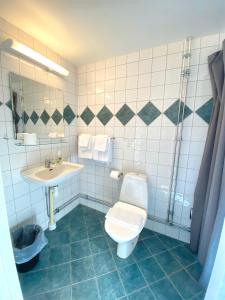 Koupelna v ubytování Hotell City
