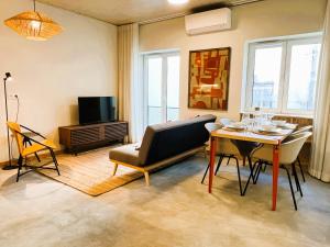 Posezení v ubytování Machadinho Modern Apartments