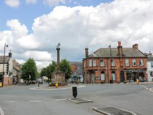 an empty street in a town with a building at West Morton Suite in Thornhill
