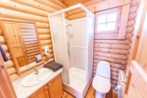 Koupelna v ubytování Brimnes Bungalows + 13 fotografií