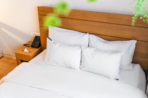Postel nebo postele na pokoji v ubytování Chuncheon Hey Hotel + 37 fotografií