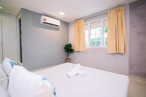 Postel nebo postele na pokoji v ubytování Swing & Pillows - PJ SS2
